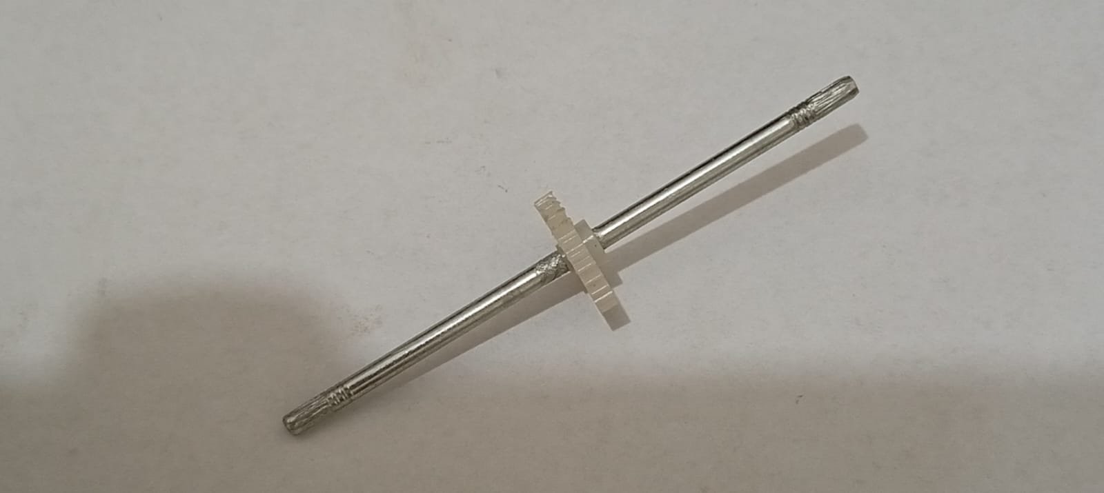 WhatsApp Image 2026-08-25 at 8.12.43 AM pins with center output gear roughed edges - Image 1